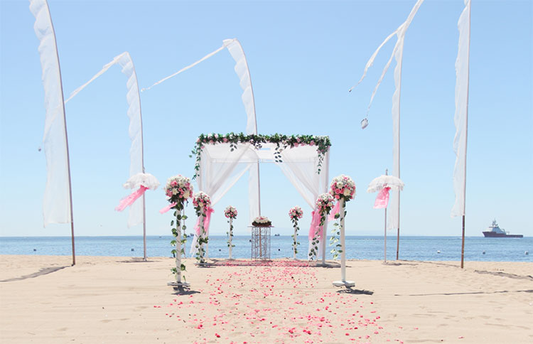 bali beach wedding, sand ceremony with the unobstructed beach as a background