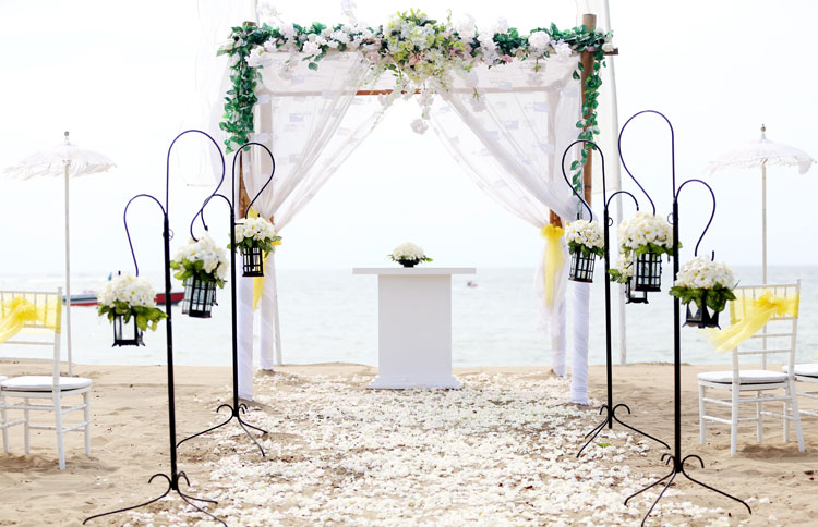 White sand ceremony beach wedding with the unobstructed beach as a background